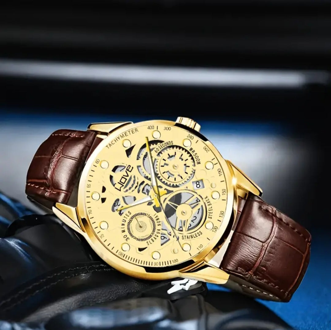 SKELTON GOLDEN TONE WAVE WATCH BLING8UK